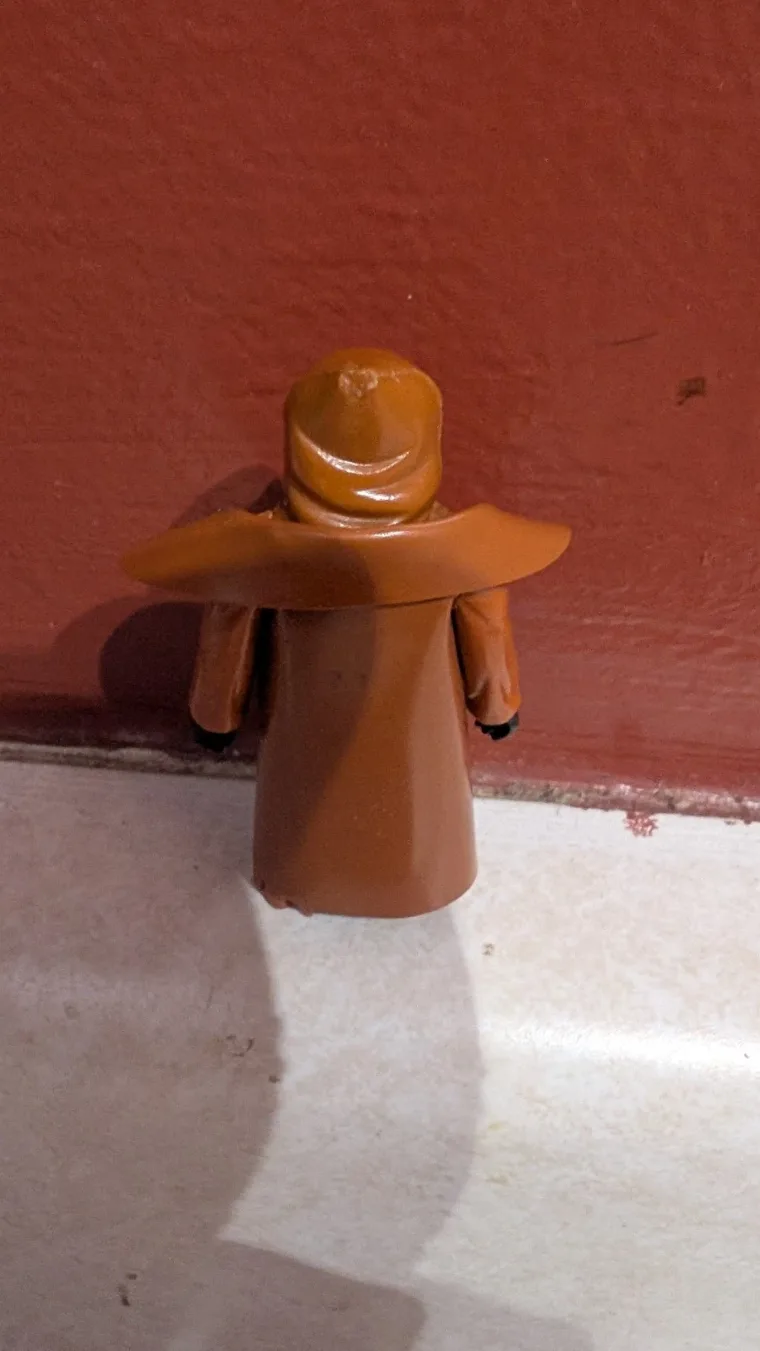 Vinyl-cape Jawa, back view, cape spread wide
